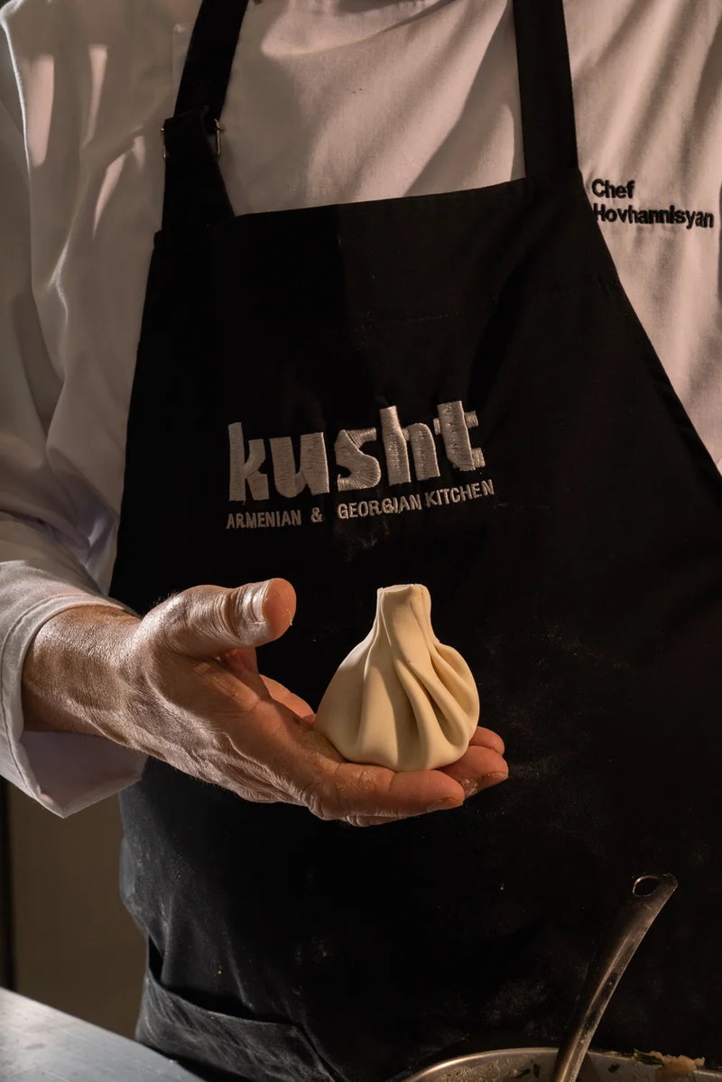 A khinkali in the chef's hand