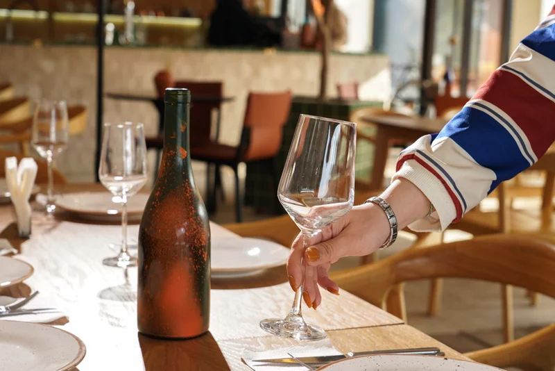 A glass of wine at the table
